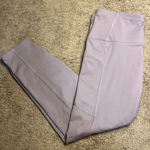 Light purple athletic leggings with pockets